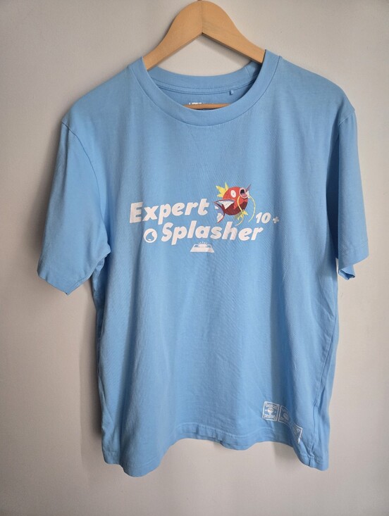 Uniqlo Tops - UNIQLO 'Pokémon Expert Splasher' Graphic Tee - Light Blue